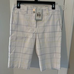 Nike Golf women’s gold shorts. NWT Size 4